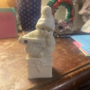 Dept 56 Snowbabies Figurine “A Smile To Treasure" July Ruby Birthday Jeweled